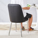 6 modern dining chairs, sleek PU backrest, and silver metal legs bring a comfortable home experience to the kitchen, bedroom, and office.Black PU Chairs with Simple Line Designs On The Backrest. - DTYStore