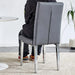 4 piece set of gray armless dining chairs brings a touch of elegance and mystery to the dining area with its deep gray tone,The grid and buckle design of the back add a vintage yet fashionable touch Default -DTYStore