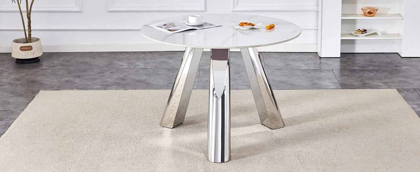 A 42-inch stainless steel leg round table with a marble top is suitable for use by four or six people Default -DTYStore