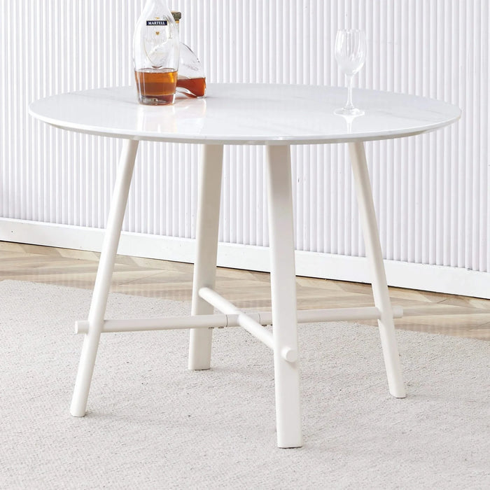 A modern minimalist circular dining table with a 42 inch diameter white patterned tabletop and white metal legs. Suitable for restaurants, living rooms, and conference rooms. Default -DTYStore