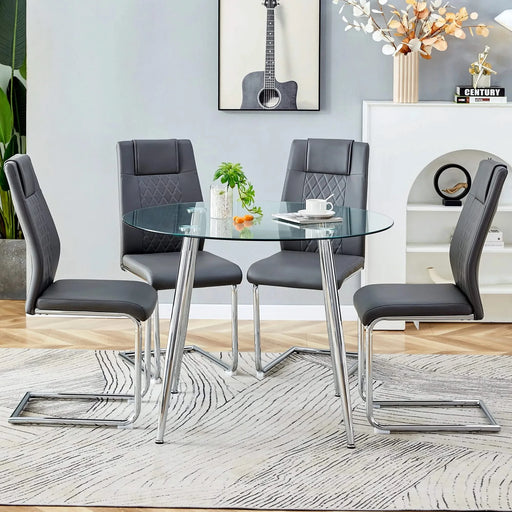 Table and chair set.A 38.6' Diameter Transparent Tempered Glass Round Dining Table-Silver Metal Legs.Paried With 4 Dark Gray High-quality PU Chairs With Silver Arched Metal Legs. Default -DTYStore